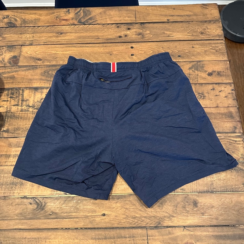 Tracksmith Navy Athletic Shorts with Red-White Waist Tab